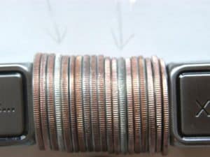 Comparison of clad and silver dimes.